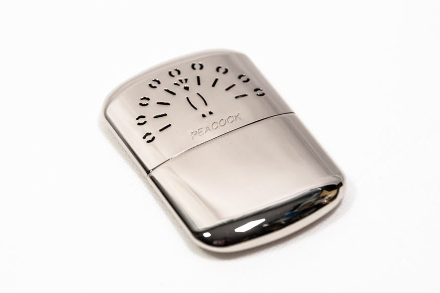 PEACOCK Pocket Warmer – REMO Since 1988